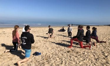 Warm up Crossfit étirements plage soleil